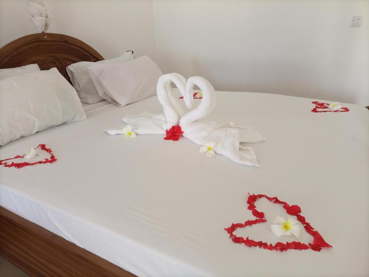 גאמביאני Visitor'S Inn מראה חיצוני תמונה